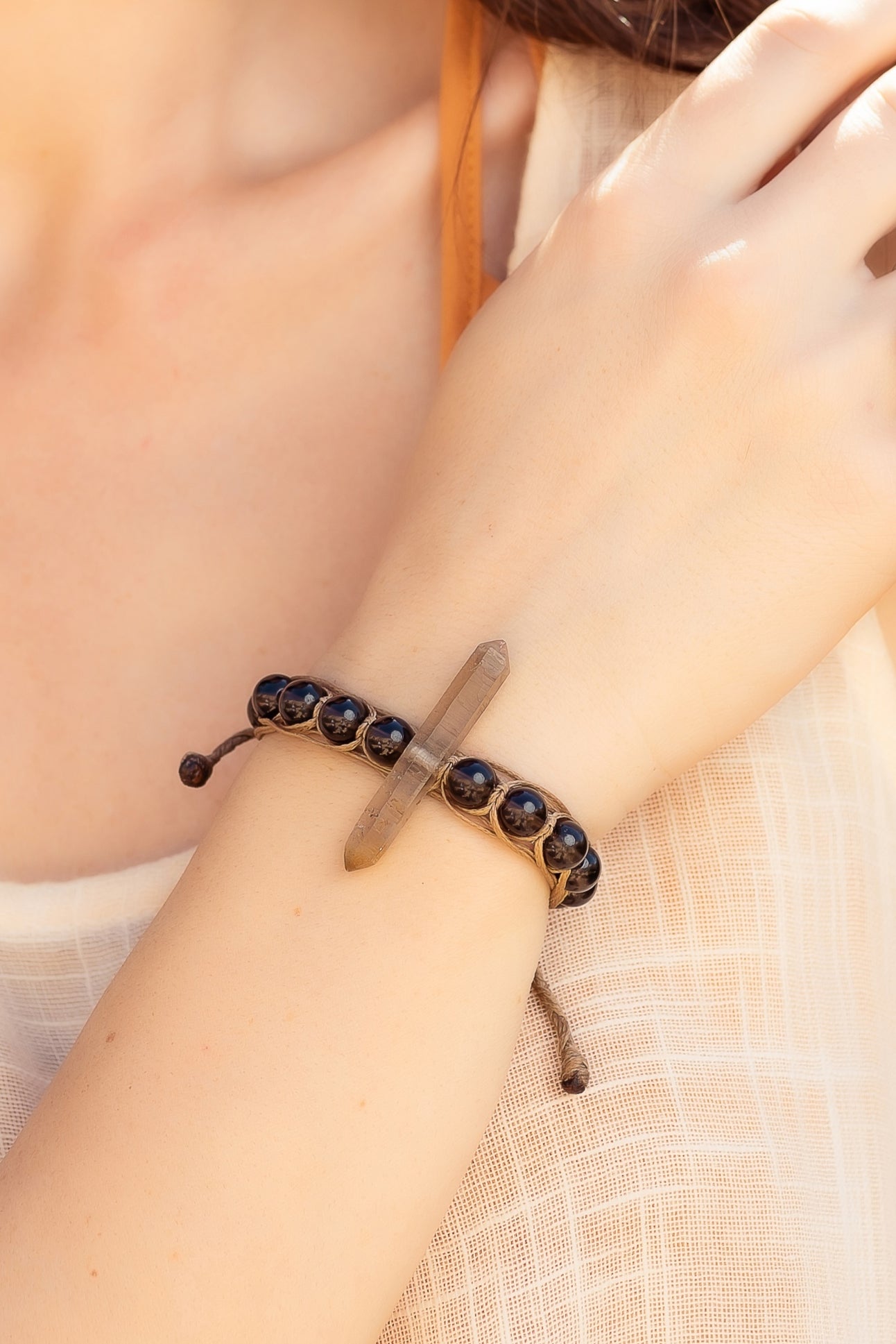 Smoky quartz double_ pointed rock with smoky beads macramé bracelet.