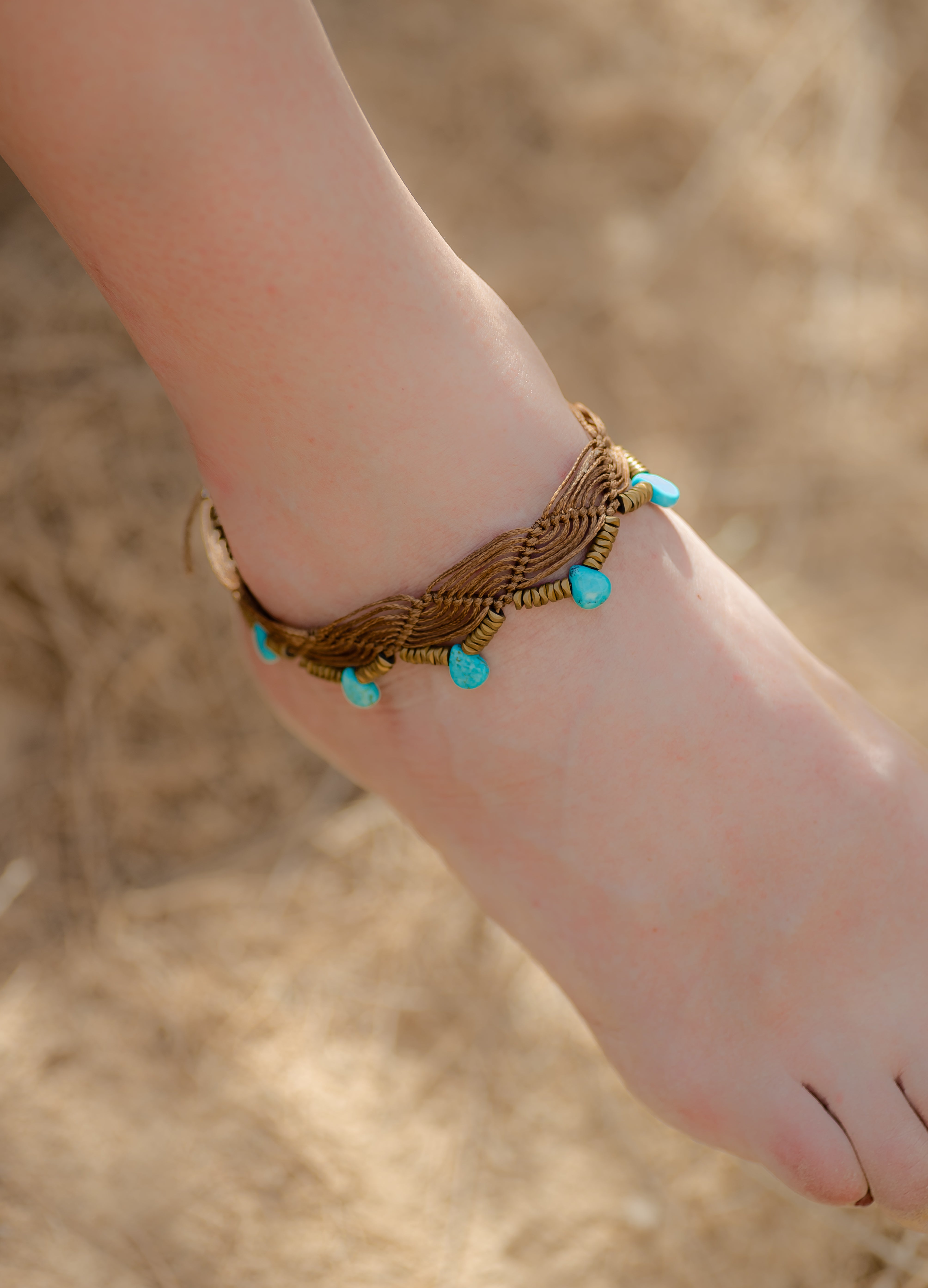 Turquoise howalite drops with hematite macramé anklet.