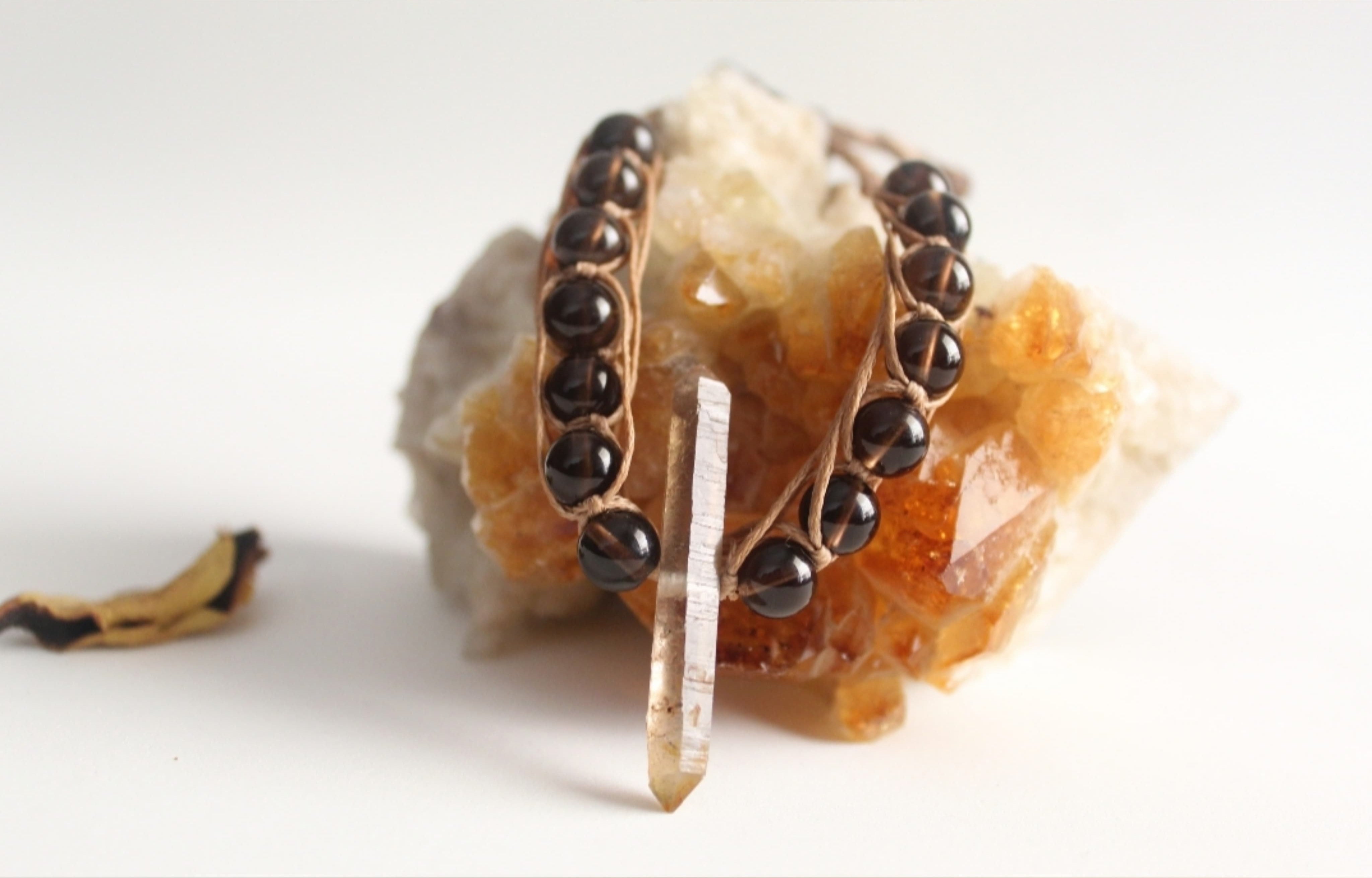 Smoky quartz double_ pointed rock with smoky beads macramé bracelet.