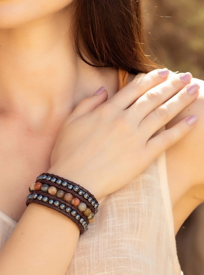 Two rows of hematite and jasper wrapped with l leather bracelet